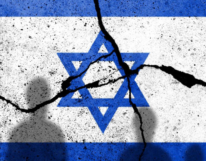 Israeli flag over broken concrete